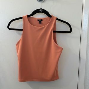 Size small. Long cropped length body contour top.